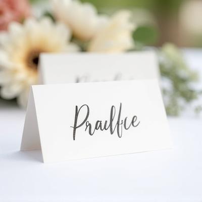 Wedding place card with guests name written in modern calligraphy